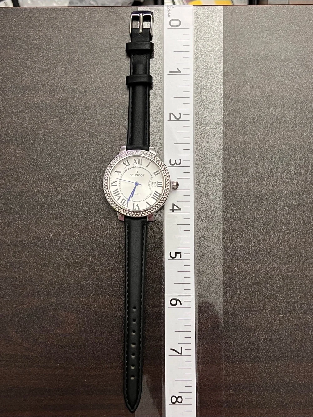 Peugeot Silver Crystal Bezel Watch with Black Strap